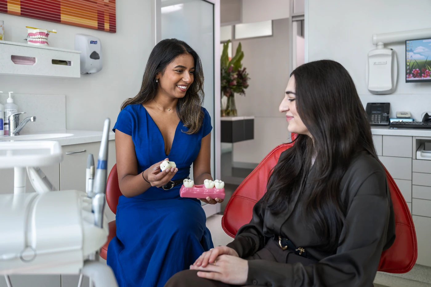 Dr Shania Paranavithana talking with a patient